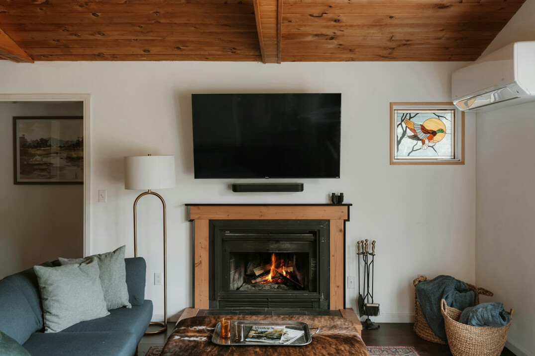 Television in a cozy living room showing a program